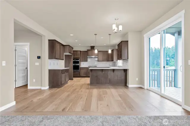 Home is under construction.  Photos, including virtually staged, are of a previously bult home in a different community with similar finishes.  Builder reserves the right to make changes to plans & specifications without notice.  Features vary by plan.  Buyer to verify square footage.