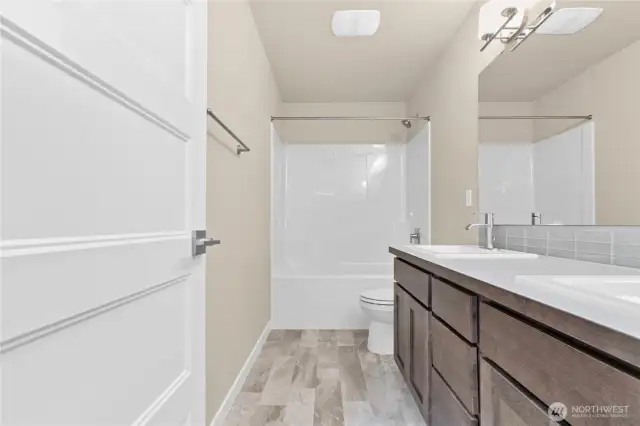 Home is under construction.  Photos, including virtually staged, are of a previously bult home in a different community with similar finishes.  Builder reserves the right to make changes to plans & specifications without notice.  Features vary by plan.  Buyer to verify square footage.