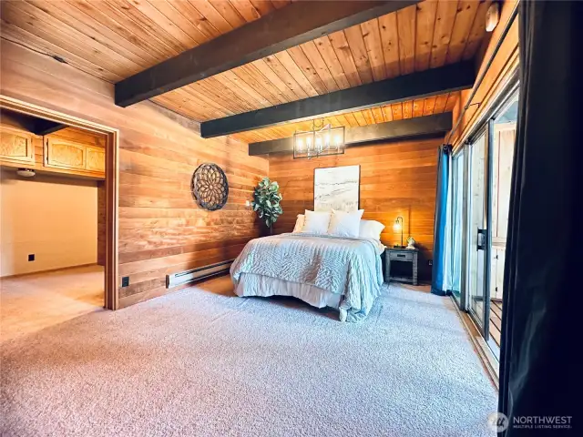 One of two primary bedroom with on-suites with solitude & deck views.