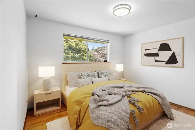 One bedroom is virtually staged.