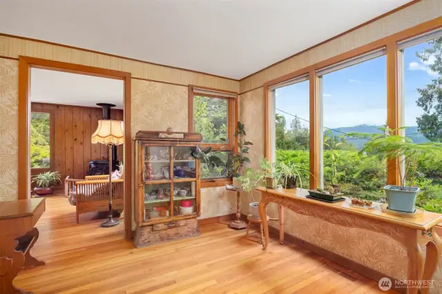 The lake views from the entry are lovely above the laurel which is a buffer from the street.