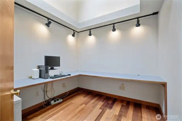 The office space is awesome and also has the Kempas wood floors and a huge skylight. The desk is built-in but could easily be removed if not needed.