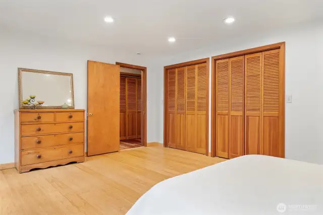 The primary bedroom has bamboo floors and also two spacious closets.