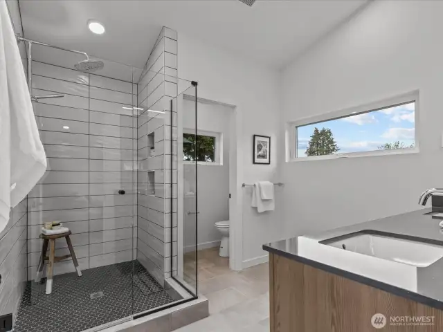 Welcome to your pristine, relaxing primary bathroom!  Model home.