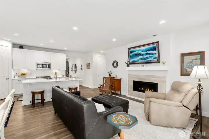 Living room with updated gas fireplace.