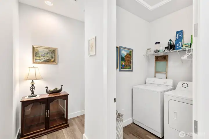 Utility space hidden away right off the kitchen.