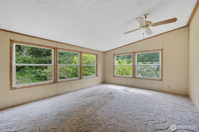Family room flanked with big windows