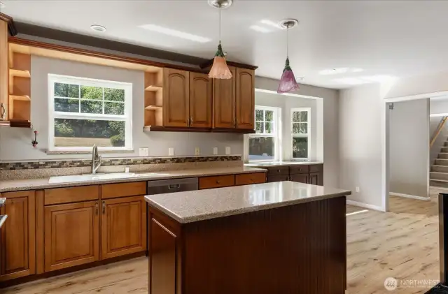 Kitchen looking towards pantry area, laundry and mud room