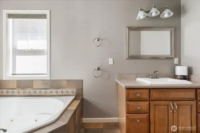 Primary bathroom with jetted bathtub