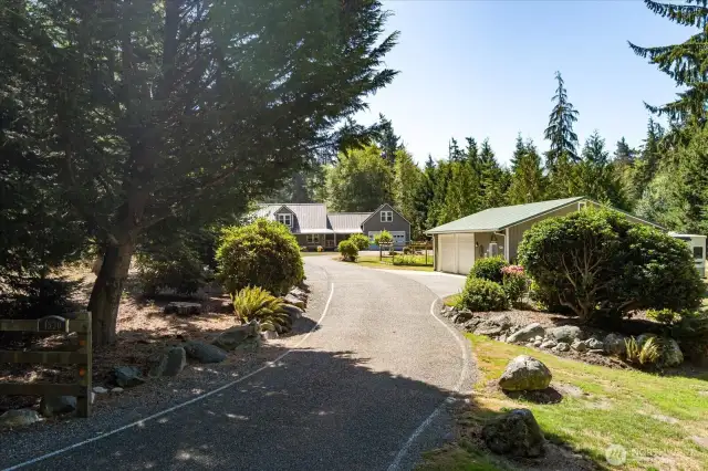 Fully paved driveway to shop and house