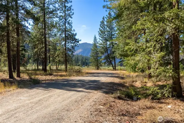 Enjoy views in every direction of the surrounding mountains and the expansive nearby meadows and farm fields.