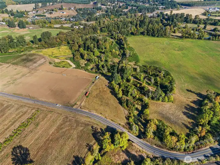 A mix of pasture, wooded areas and river front.