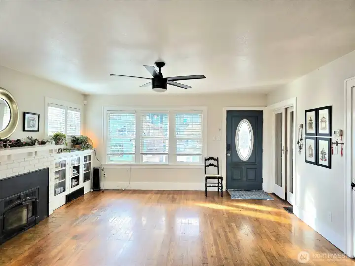 Wood stove and built ins with lots of windows. Great light!