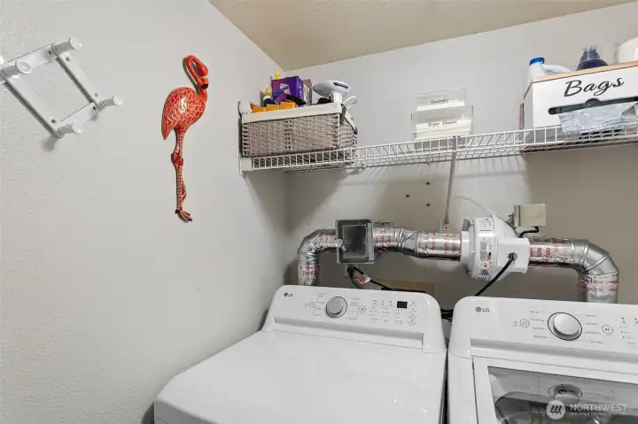 washer and dryer with booster fan