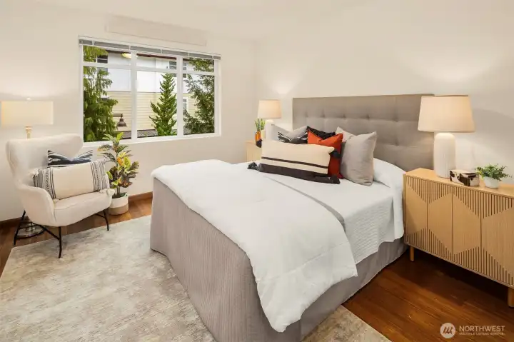 Generous primary suite with plenty of room for a king size bed