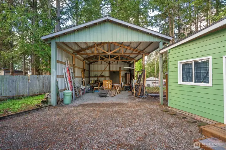Detached RV parking/carport room for 4+ vehicles.