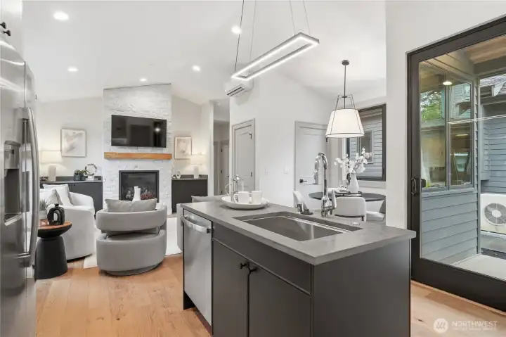 Guest house features kitchen, dining, living, and full size laundry units.