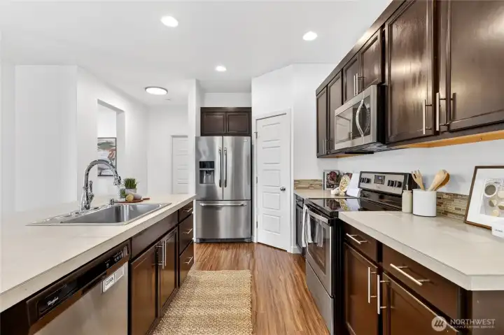 Kitchen features Stainless Steel appliances, plenty of storage and a pantry