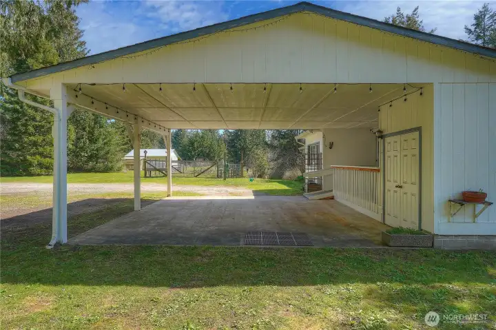 Ideal for guests, extended living, or potential rental opportunity.    Covered front porch provides a welcoming entry and a comfortable space to relax outdoors. Ideal for enjoying the peaceful surroundings and taking in the natural setting.