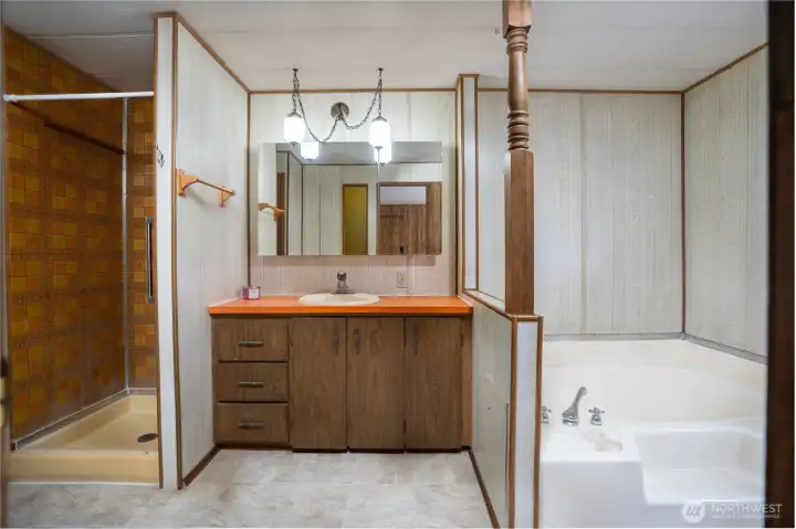 Spacious bathroom located off the main bedroom, offering a private and functional layout.