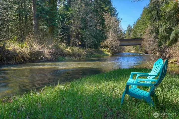 Rare 530 feet of high-bank river frontage, offering privacy, elevated views, and a serene natural setting to enjoy the water year-round.