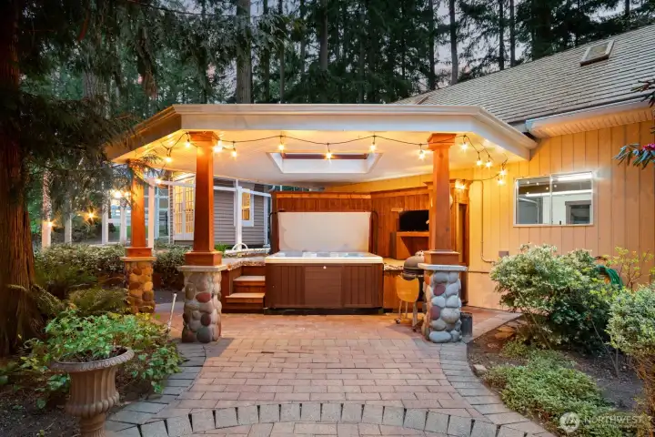 Covered spa and patio space