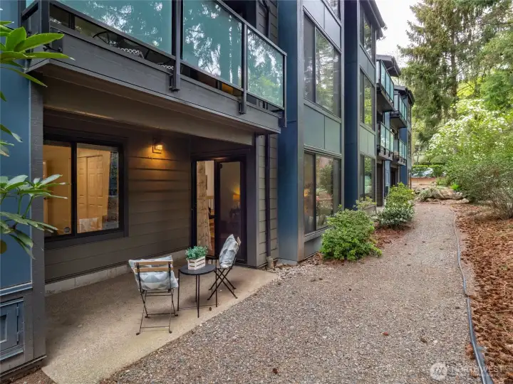 The patio looks out to a park-like central green space - what a peaceful spot to sip morning coffee!