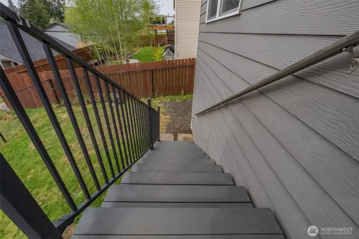 Stairs to Fenced Backyard