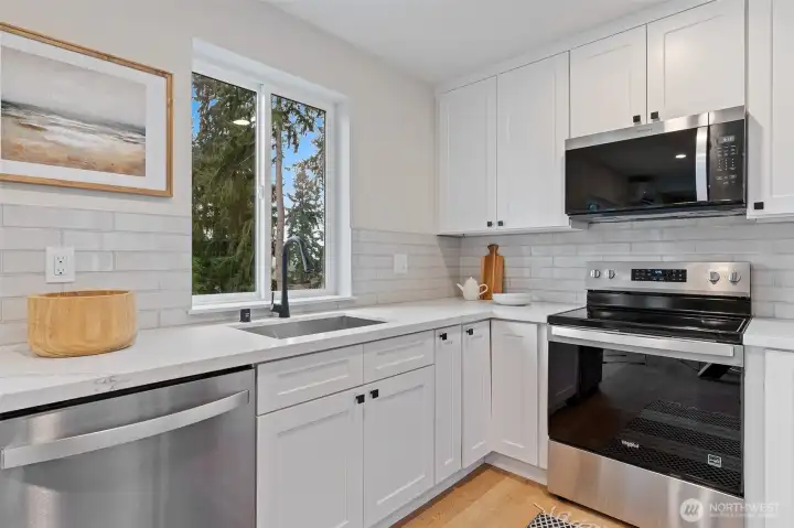 Bright kitchen with window over the sink.