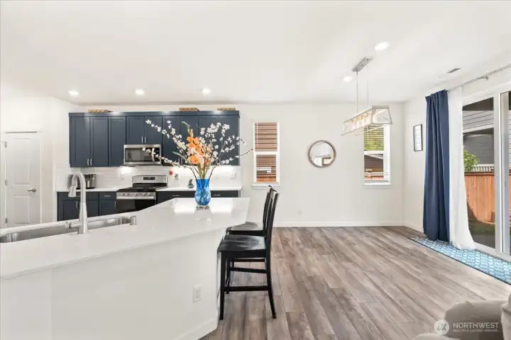 Spacious dining area opens seamlessly to the backyard patio. Spacious dining area opens seamlessly to the backyard patio.