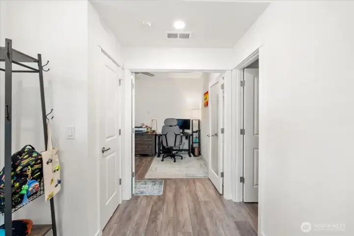 View to the flexible space that is a true bedroom and could also be used as an office. View to the flexible space that is a true bedroom and could also be used as an office.
