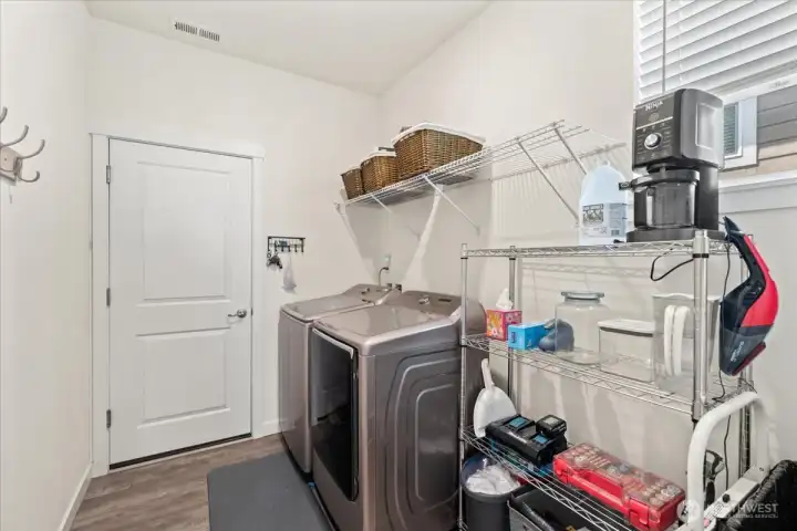 Convenient mudroom off the garage with washer and dryer included. Convenient mudroom off the garage with washer and dryer included.
