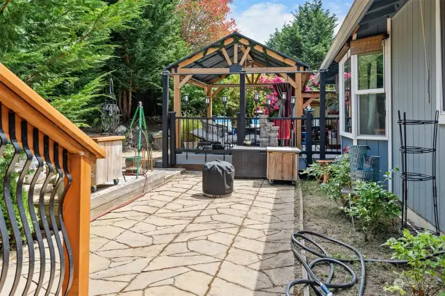 Concrete paver patio leads to a wonderland of options for ultimate backyard entertainment.