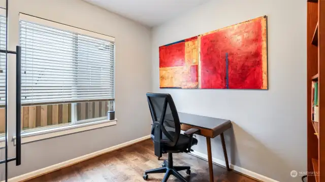 This room features a minimalist home office design, perfect for productivity and focus.