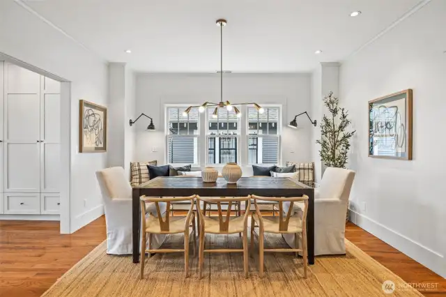 Cozy dining room features built-in bench with storage drawers