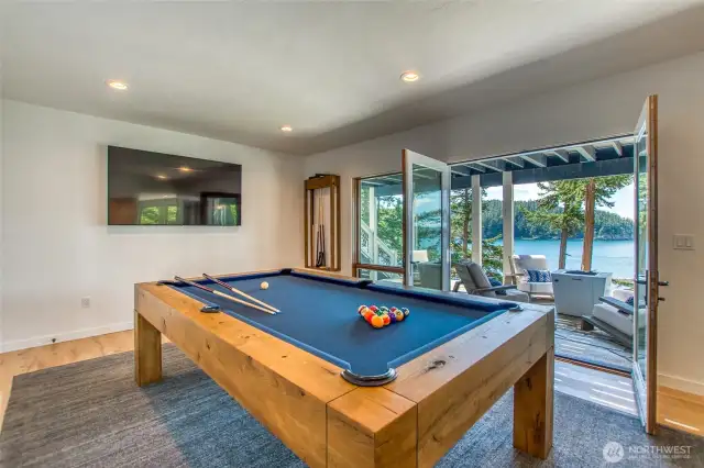 Entertainment room with outdoor deck seating.