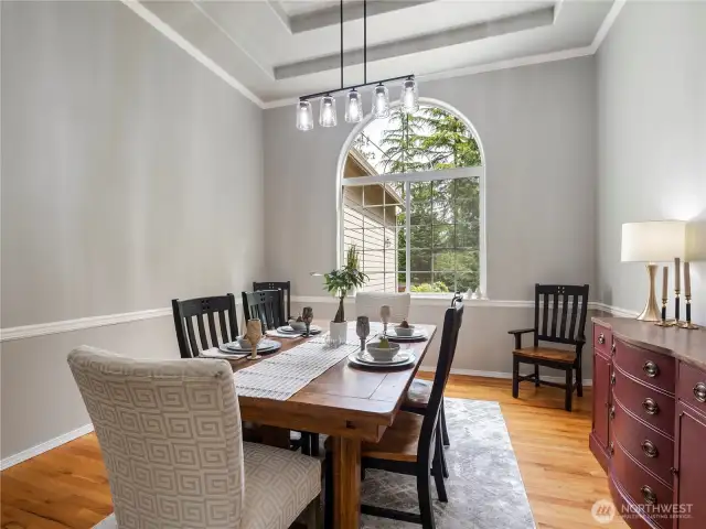 Private dining room with vaulted coved ceilings, can easily accommodate a table for 10 plus a side table or hutch.