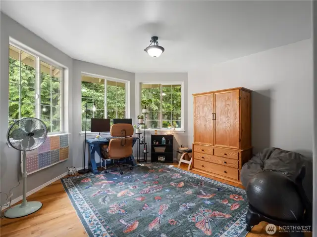 Office/den is to the front of the house with a great view of the natural setting.