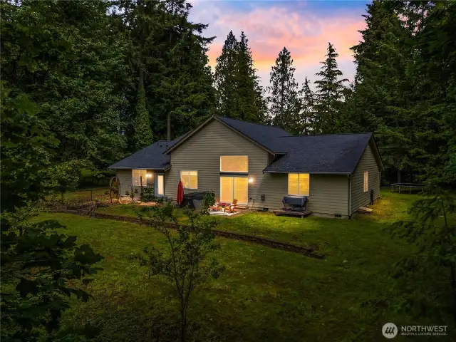 The rear view of the back of the home really shows how well situated the house is on this half acre lot.