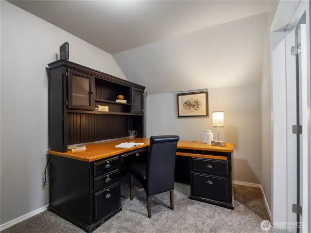 Flex space in the landing of the upper floor is great for an office space, library, craft area, etc.