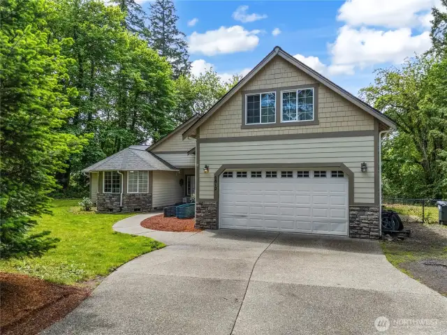 Classic NW Traditional style home. Most of the rooms are located on the main floor. The upper level has a flex space, bonus room, and a newly remodeled full bathroom.