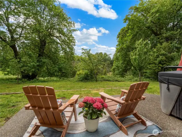 Just off the living room is a patio and partially fenced backyard. Enjoy watching the skyline change colors as the sunsets.