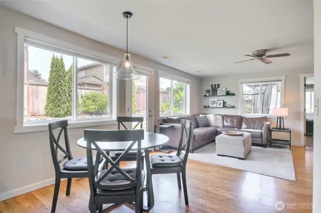 Eating area off of the kitchen and family room with tons of natural ligting and space.