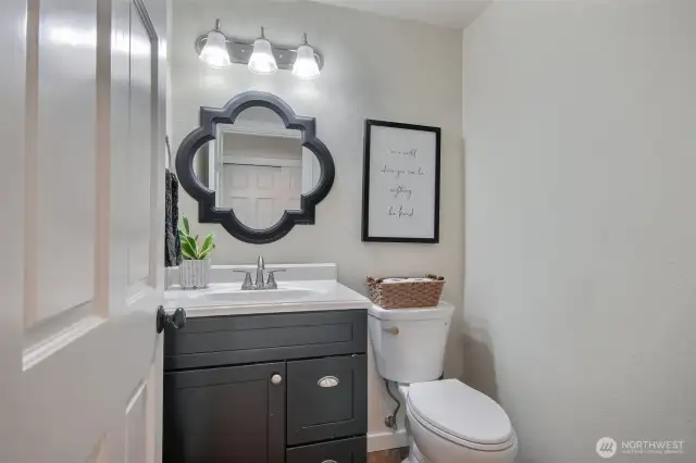 Stylish half bathroom on the main floor.