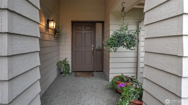 A useful covered front porch for our occasional rainy weather.  The home has been pre-inspected and available to you through your Buyer's Broker.