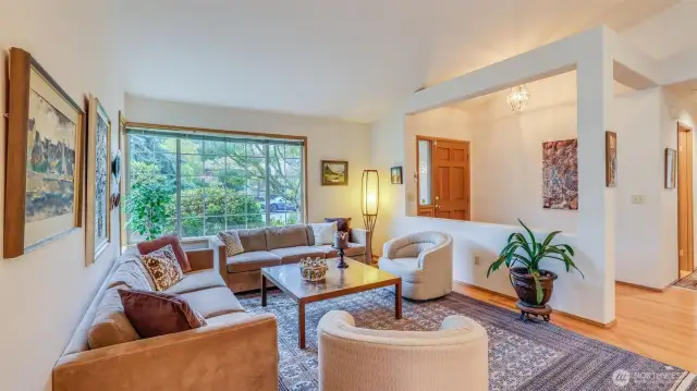 A little different view looking from the dining room into the living room and down the hall.
