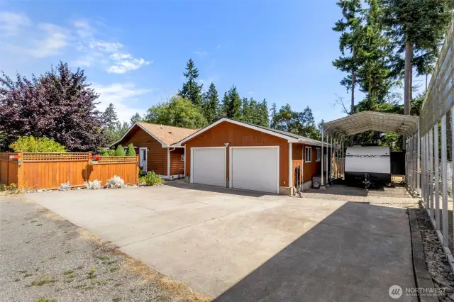 Huge 2-car garage or shop, RV and boat covered parking.
