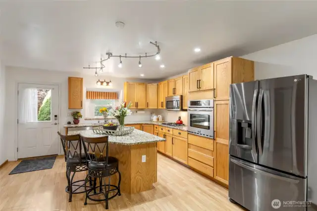 Granite counters and stainless appliances.