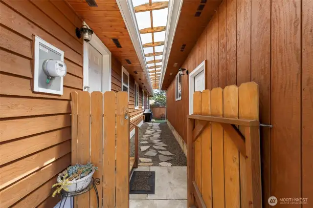Covered area to the garage is thoughtful in the winter months.