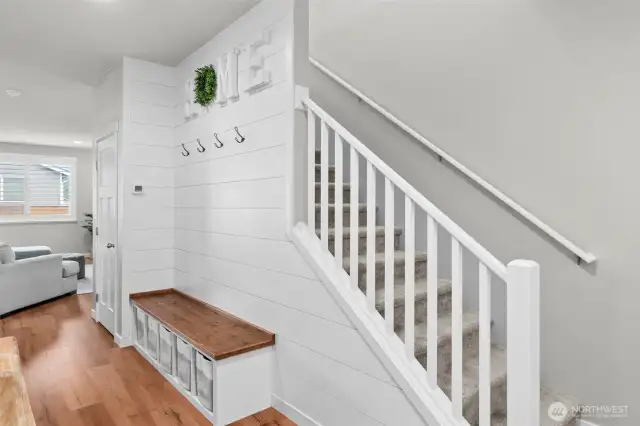 Warm and welcoming entry with built-in bench with storage.